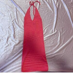 Pink halter neck dress with a flattering fit